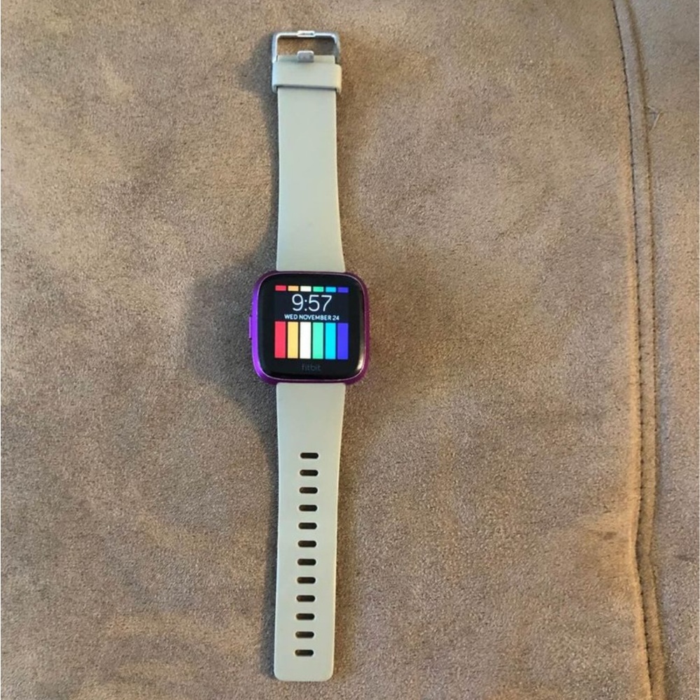 Fitbit versa lite with extra bands and charger